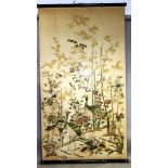 A LARGE CHINESE STYLE PRINTED SILKWORK PICTURE depicting birds amongst a bamboo grove. 7ft 6ins x