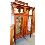 A GOOD LIBERTY & CO MAHOGANY AND INLAID STANDING DISPLAY CABINET (STAMPED LIBERTY & CO).