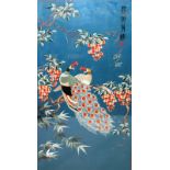 A CHINESE SILKWORK PICTURE of a peacock and peahen amongst flowering trees, signed, framed and