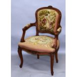 A FRENCH STYLE TAPESTRY UPHOLSTERED BEECH FRAMED SMALL ARMCHAIR.