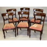 A SET OF SIX WILLIAM IV MAHOGANY DINING CHAIRS, with plain overhanging top rail, carved tie-bars,