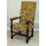 A FRENCH STYLE TAPESTRY UPHOLSTERED OAK FRAMED LARGE ARMCHAIR.