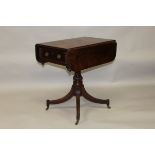 A REGENCY MAHOGANY DROP FLAP PEDESTAL TABLE, with a drawer to one end, turned and carved column