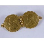 2 SOUTH AFRICAN GOLD HALF POUND COINS MOUNTED AS A BROOCH