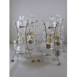 SET OF 4 MATCHING ARTS AND CRAFTS STYLE PLATED CONDIMENT/ CRUET SETS ON STANDS