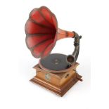 A Pathe disk phonograph with horn Early 20th century, French, marked to stylus arm "Reproducteur