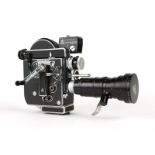 A Bolex H-16 Reflex REX-4 16mm motion picture film camera, zoom lens and accessories Circa 1965,