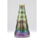 A Loetz iridescent art glass vase Early 20th century, signed "Loetz / Austria", of undulating