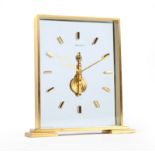 A Jaeger LeCoultre Skeleton Clock Circa 1962, brushed gilt brass body with glazed front and rear