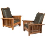 A pair of oak Morris chairs, Warren Hile Studio Late 20th century, apparently unsigned, each with