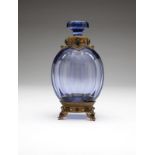 A brass-mounted lavender art glass decanter Late 20th century, signed to base ''Austria'', with a