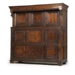 A Jacobean-style marquetry cupboard 17th century or earlier, in the James I taste, with retailer's