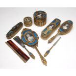 A French gilt-bronze and enamel vanity set Late 19th/early 20th century, all but the comb marked ''