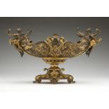 A French parcel-gilt bronze centerpiece bowl Late 19th/early 20th century, with dual parcel-gilt