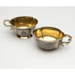 1023  Two Russian silver-gilt and niello brandy cups Each Moscow, the first dated 1776 and with