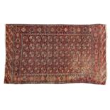 1011  A Tekke Turkoman room-sized carpet Late 19th century, wool on wool foundation, with a