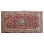 1192  A large room-sized Persian rug Circa 1940s, wool on cotton foundation, central medallion on