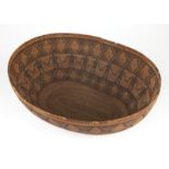 1106  A Yokuts polychrome friendship basket Early 20th century, a coiled oblong basket with two