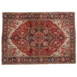 1231  A large Heriz variety Persian rug First half 20th century, wool on cotton foundation, a room-