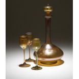 1058  L.C. Tiffany Favrile decanter and 3 cordial stems Each cordial glass with etched signature