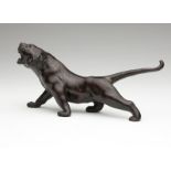 1049  A Japanese patinated bronze tiger Meiji period, signed to underside, a patinated bronze figure