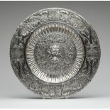 1106 A Spanish .916 silver repousse charger Late 19th/early 20th century, marked ''916'' and with