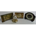 Assortment of mantle clocks and domed gl