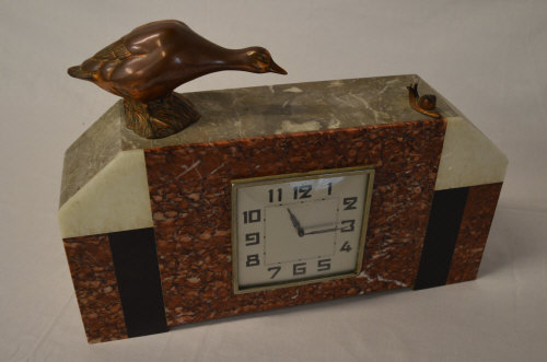 French Art Deco clock featuring a duck &