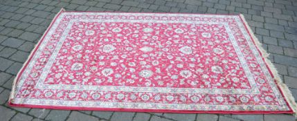 Red ground Kashmir rug with all over des