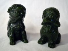 2 Jade style dog figures