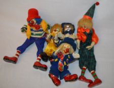 5 clown figures, possibly continental