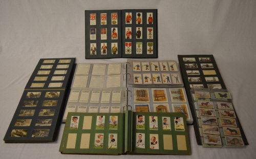 Lg quantity of cigarette cards in albums