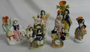 Six Staffordshire flat back figurines (A