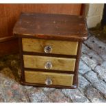 Miniature chest of drawers & contents in