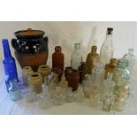 Assorted bottles & lidded pot