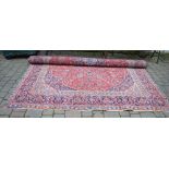 Handwoven Persian Kashan carpet with an