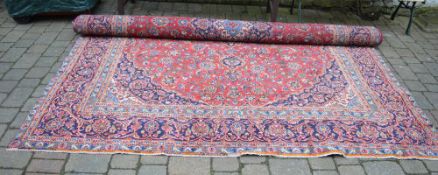 Handwoven Persian Kashan carpet with an