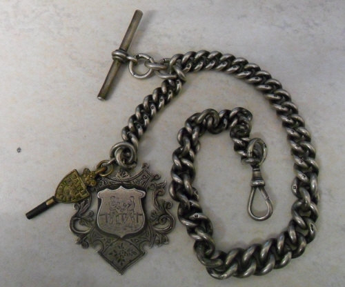 Silver watch chain and fob with boxing e