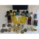 Box containing die cast cars & medallion