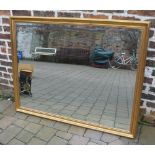 Large wall mirror with gilt frame