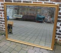 Large wall mirror with gilt frame