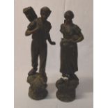 Spelter figures of a man and lady (af)