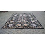 Large black Axminster carpet , 9' x 12'