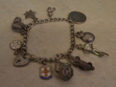 White metal charm bracelet, including 11