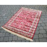 Red ground Kashmir rug 170cm x 120cm