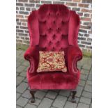 Red upholstered wingback armchair (shipp