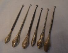 6 Silver handled button hooks total weig