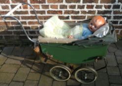 Dolls pram with doll