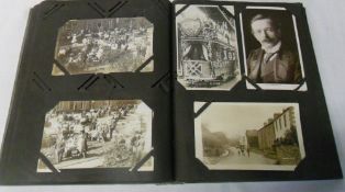 Large album of assorted postcards contai