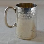 Small silver tankard with engraved motif